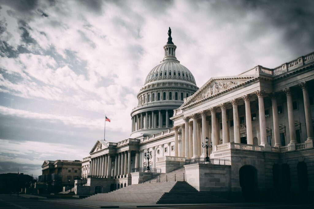Photo of the U.S. Capitol building under a cloudy sky