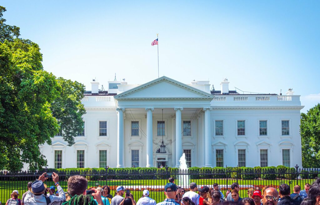 Photo of tourists in front of the White House
